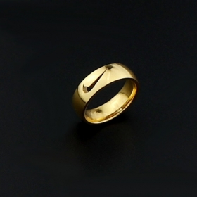 Кольцо Nike с прорезанным логотипом золотистое