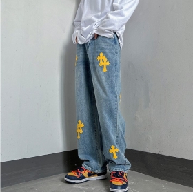 Стильные синие джинсы с жёлтыми кожаными крестами от Locketomy