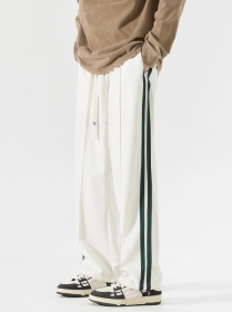 Белые штаны на резинке ACUS модель с зелеными лампасами