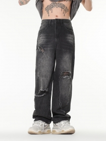 Чёрные с потёртостями и разрезами джинсы бренда OREETA