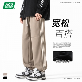 Серые штаны от бренда ACUS с эластичными резинками на штанине