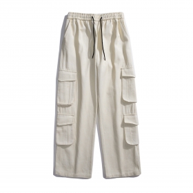 Лёгкие хлопковые штаны молочного-цвета от бренда Locketomy на резинке