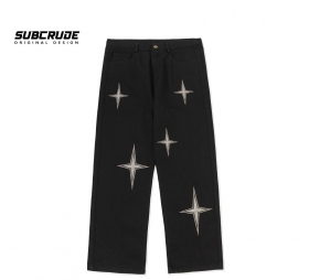 Чёрные с нашитыми звёздами джинсы Subcrude с низкой посадкой
