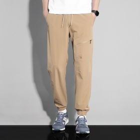 The North Face бежевого цвета штаны с эластичной резинкой