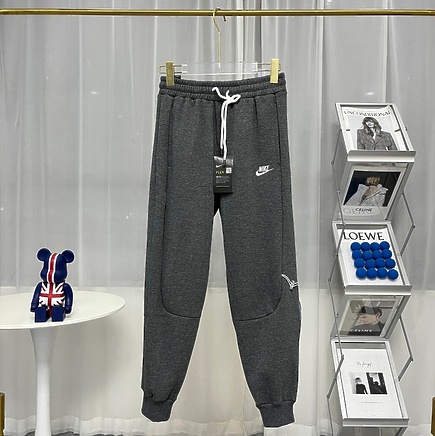 Серые спортивки Nike Swoosh Loose Fit