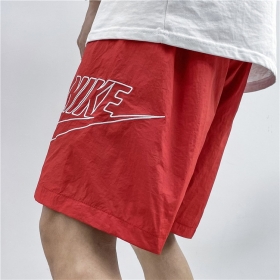 Красные Nike шорты с карманами повседневные для занятий спортом