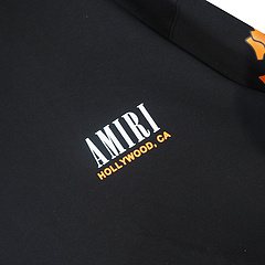 Черное худи AMIRI с фирменным принтом "оранжевые кости"