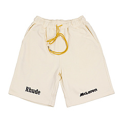 Кремовые шорты бренда RHUDE с фирменным лого и надписью "McLAREN"