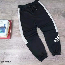 Спортивные чёрные штаны Adidas на резинке зауженные снизу