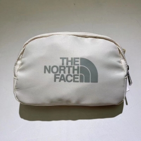 С надписью спереди The North Face сумка в сером цвете