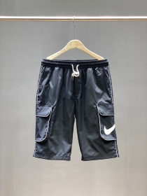 Чёрные светоотражающие шорты Nike на резинке карманами