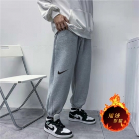 Стильные штаны Nike серого цвета на резинке с лого