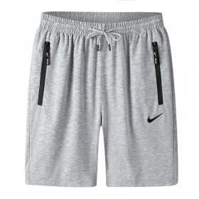 Nike серые шорты на резинке со шнурком и карманами на молнии